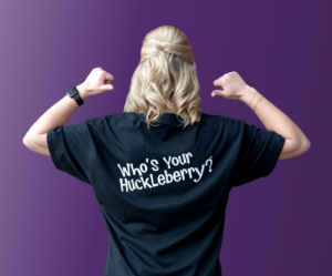 Huckleberry Hucks T-shirt the slogan Who's Your Huckleberry? on the back.