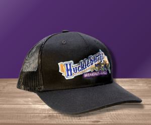 Huckleberry Hucks classic ballcap in trucker style with Huckleberry's logo on it.